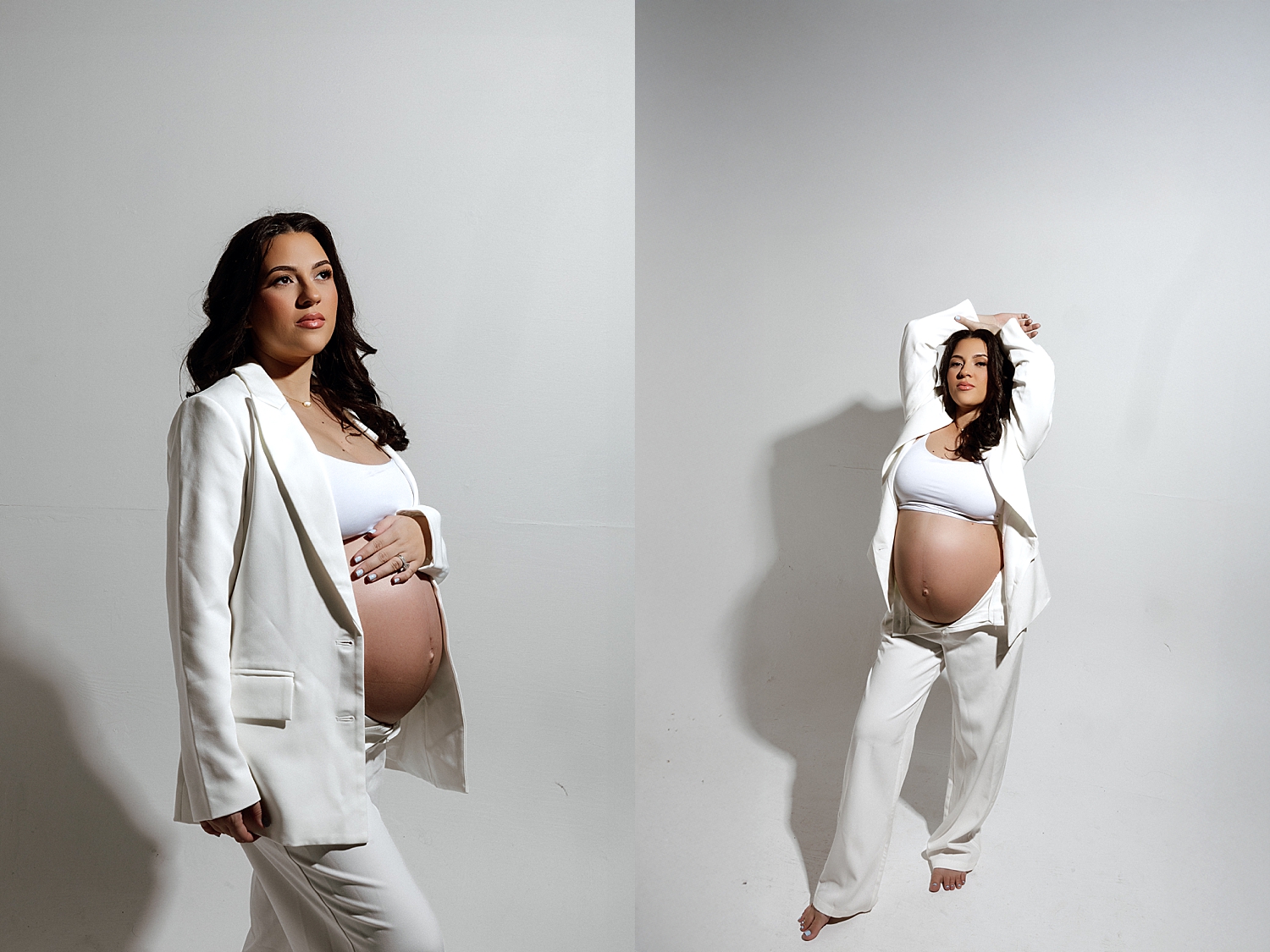 expecting mom stands in front of white backdrop by Love Kay Collective